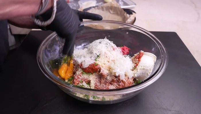 Place meatballs on a parchment-lined baking sheet.