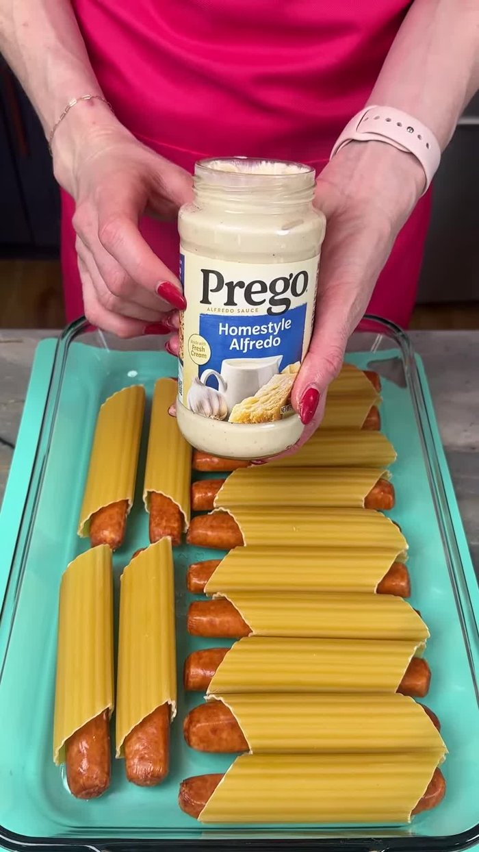 Drizzle home-style Alfredo sauce over the noodles.