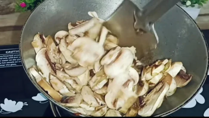 Add chopped mushrooms and fry until softened and the water evaporates.