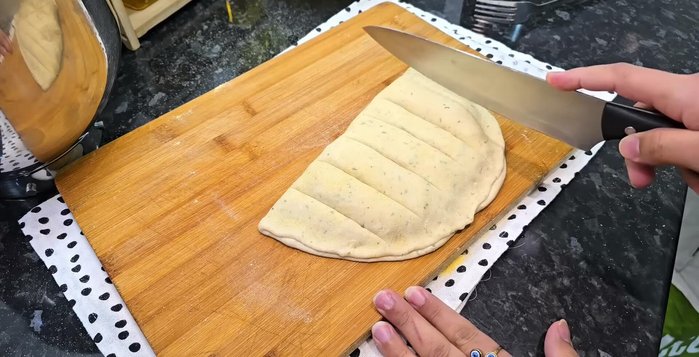 Bake garlic bread at 180°C (356°F) for 15-20 minutes.