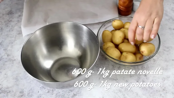 Prepare potatoes: Halve potatoes, season with salt, pepper, oil, rosemary, and cumin. Roast at 200°C for 30-35 minutes.