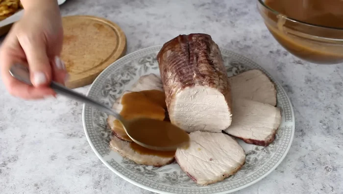 Serve: Slice the pork loin and serve with the sauce, roasted potatoes, and artichoke pasta.