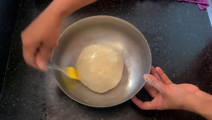Cover the bowl and let the dough rise in a warm place for 2-3 hours, or until doubled in size.