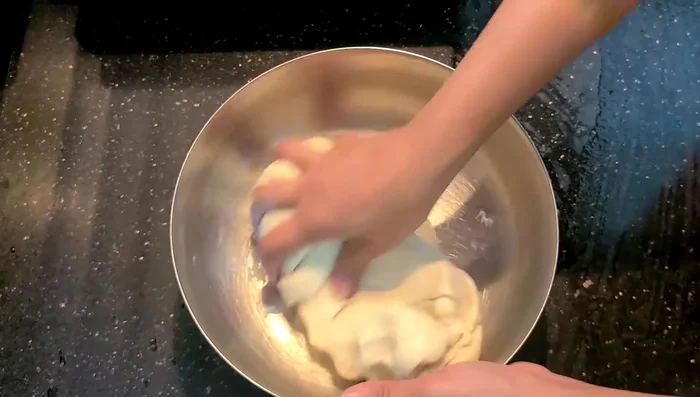 After 2-3 hours, knead the dough again for 10 minutes.