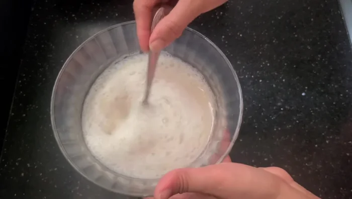 Add 3 cups of flour and salt to the yeast mixture. Mix well with your hands (or in a dough maker).