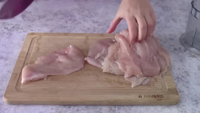 Cut the chicken breast into smaller pieces and mince it in a blender (or buy pre-minced chicken).
