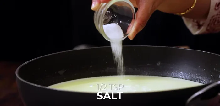 Season the sauce with 1/2 teaspoon salt, 1/4 teaspoon pepper, 1 teaspoon chili flakes, and 1 teaspoon Italian seasoning.