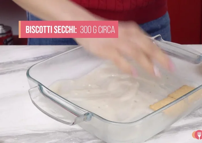Slowly add biscuits, using a total of 300g, until all ingredients are used.