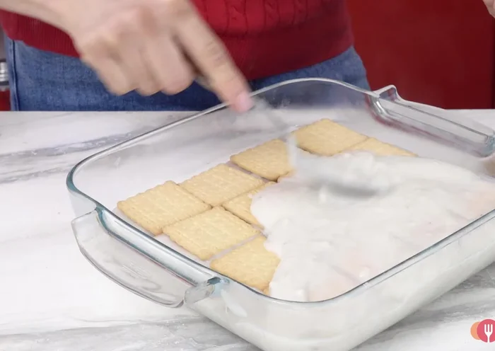 Once cooled, refrigerate for at least 2 hours to allow the cream to firm up.