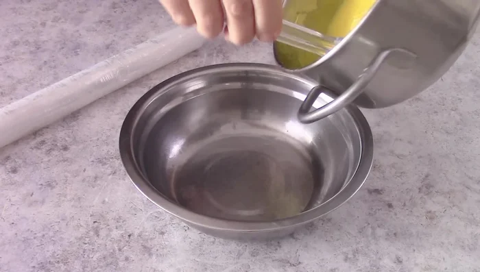 Pour the custard into a bowl, cover with cling film, and let it cool.