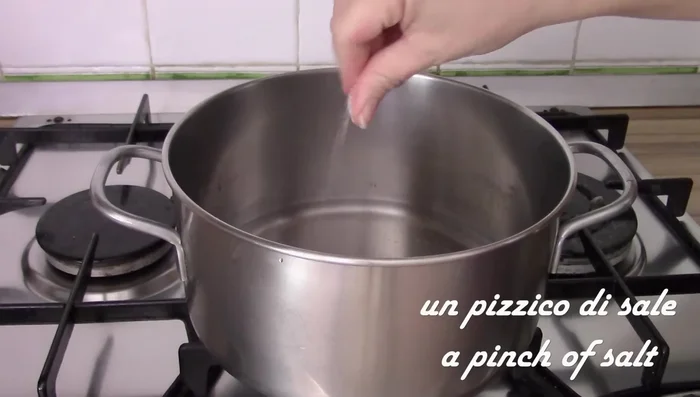 Prepare sho pasta dough: Boil water, salt, and butter. Add flour and mix until a ball forms.