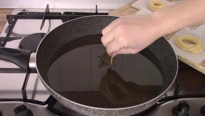 Fry the zeppole in hot oil, removing the baking paper.