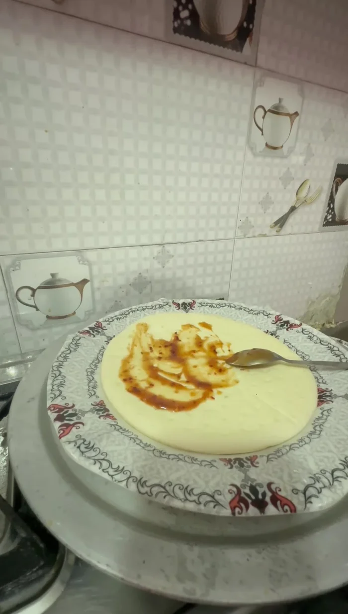 Apply pizza sauce to the inside of the cone.