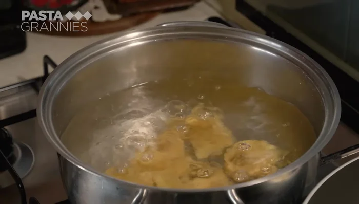 Melt butter in a pan with sage leaves. Add the cooked cappellacci and toss to coat. (518)