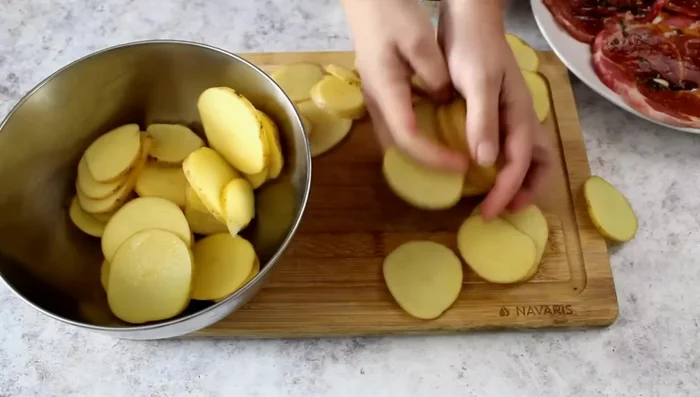 In a bowl, combine potatoes with remaining marinade. Mix well.