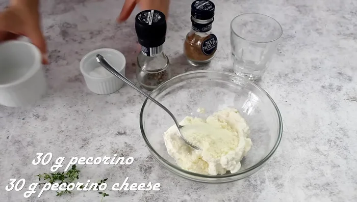 Prepare ricotta cream: Mix ricotta, pecorino, salt, pepper, nutmeg, thyme, and pasta water until creamy.