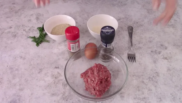 Prepare the stuffed artichokes: Clean and prepare the artichokes, removing tough leaves and the fuzzy choke.