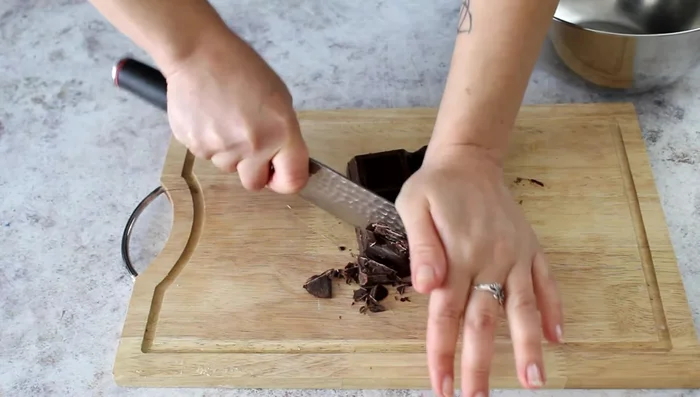 Prepare chocolate salami: melt chocolate. Combine with melted butter, sugar, cocoa powder, and milk. Mix well.