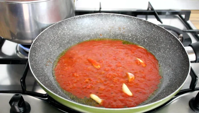 Add the spaghetti directly to the pan with the soffritto. Use a large pan to accommodate the spaghetti.