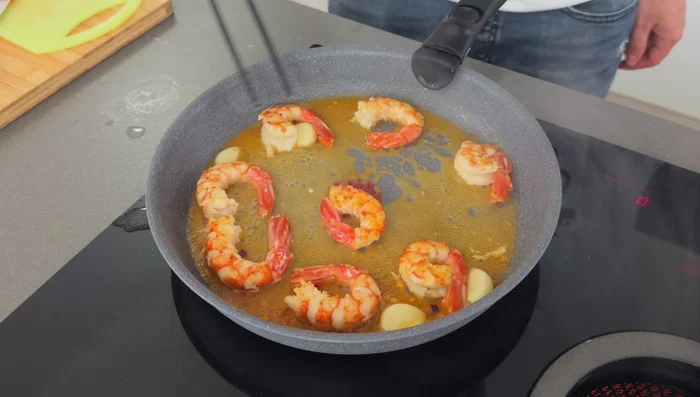 Add a splash of white wine to the pan and let it reduce.