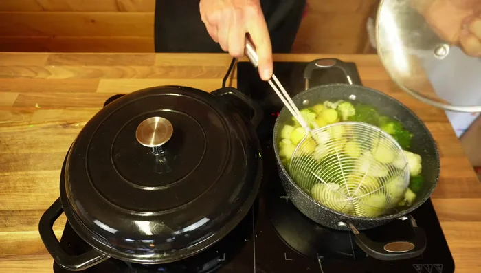 Continue to cook until broccoli, cauliflower, and potatoes are partly cooked.