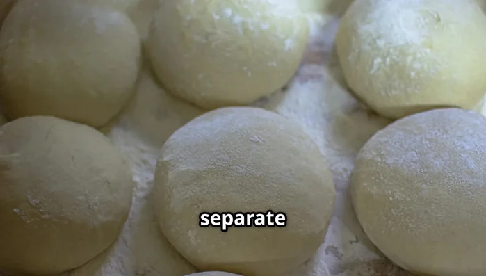 Divide dough, place in oiled containers, and refrigerate for at least 24 hours (up to 72 hours).