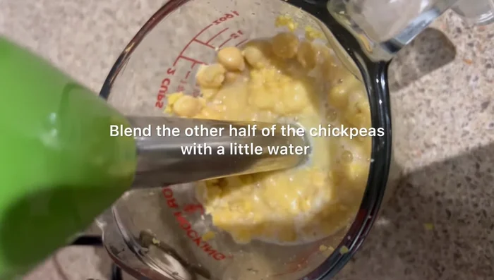 Blend the reserved chickpeas with a little water until smooth and creamy.