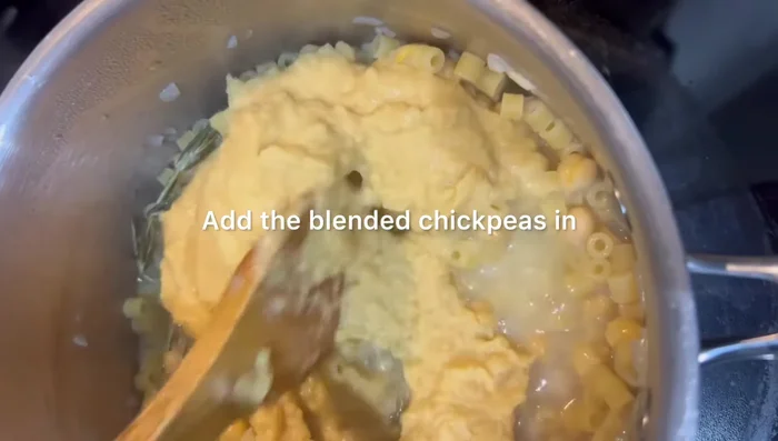 Add the blended chickpeas to the pot and stir to combine.