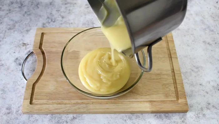 Cool the cream and cover with cling film to prevent a crust from forming.