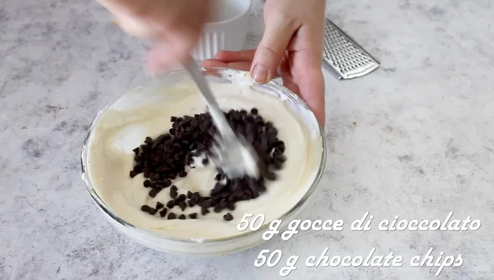 Add chocolate drops to the ricotta mixture and mix well.