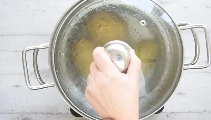 Boil potatoes in salted water for 20 minutes. Do not peel before boiling.
