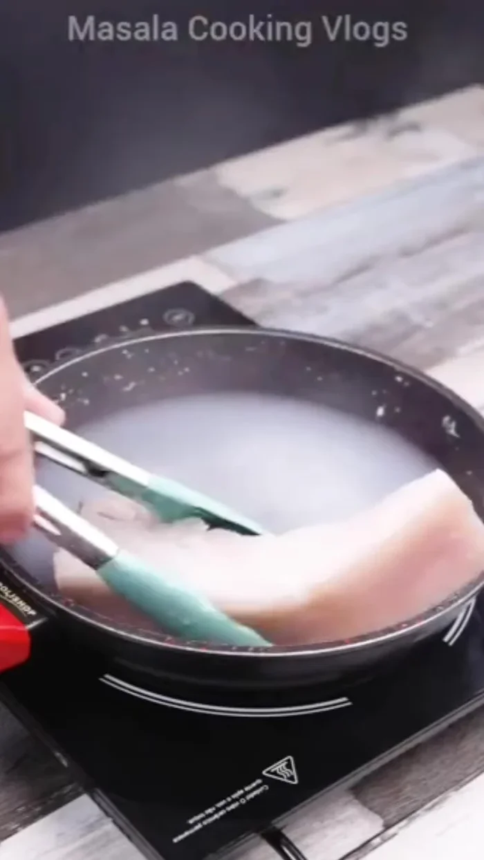 Remove pork, dry well with paper towels, and cut in half (Method 1).