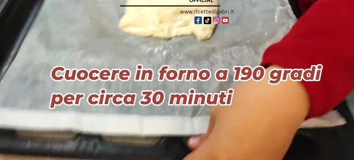 Bake the pizza in the oven until golden brown and cooked through.