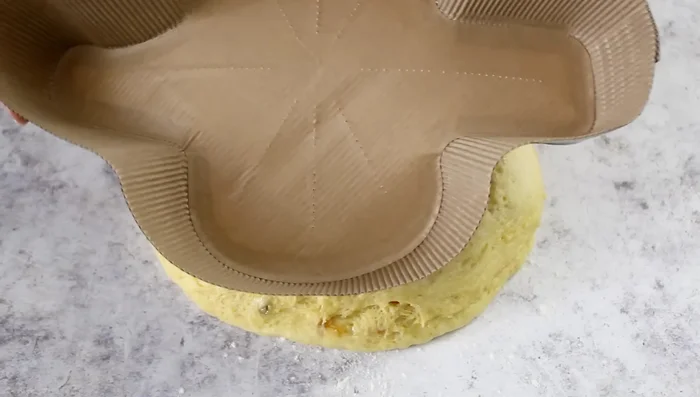 Shape the dough into a colomba using half the dough for the body and the remaining for wings. Let rise again in a colomba mold for about 2 hours.