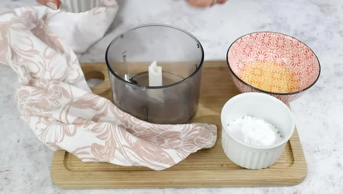 Prepare the icing: Blend almonds, icing sugar, and egg white until smooth.