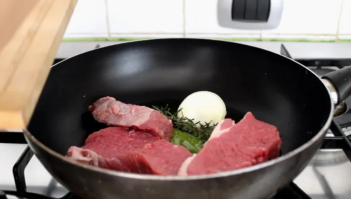 Brown the veal slices well in the pan to seal in the juices.
