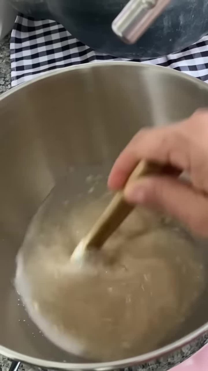 Add eggs, butter, a pinch of salt, and flour gradually, mixing until dough is smooth and elastic (about 5 minutes).
