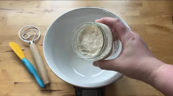 The next morning, your starter should have doubled. Measure out 150g of starter.