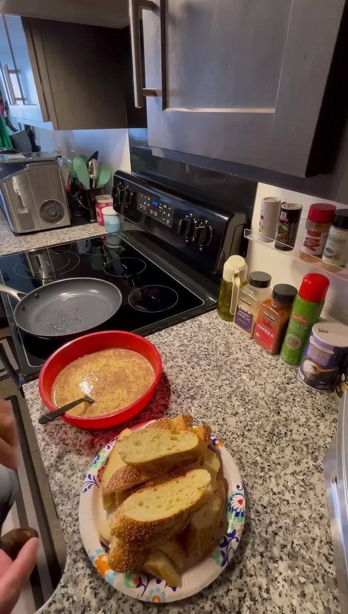 Dip each slice of bread into the egg mixture, ensuring both sides are coated.