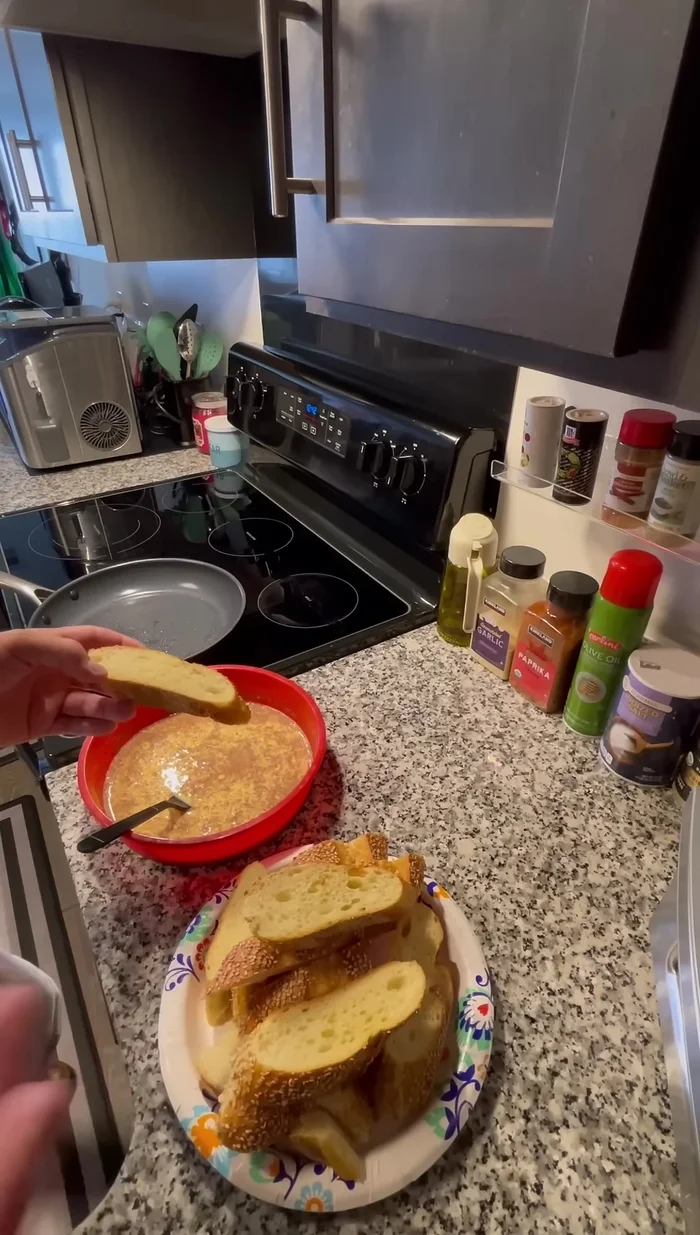 Cook the bread slices in a buttered pan until golden brown on both sides.