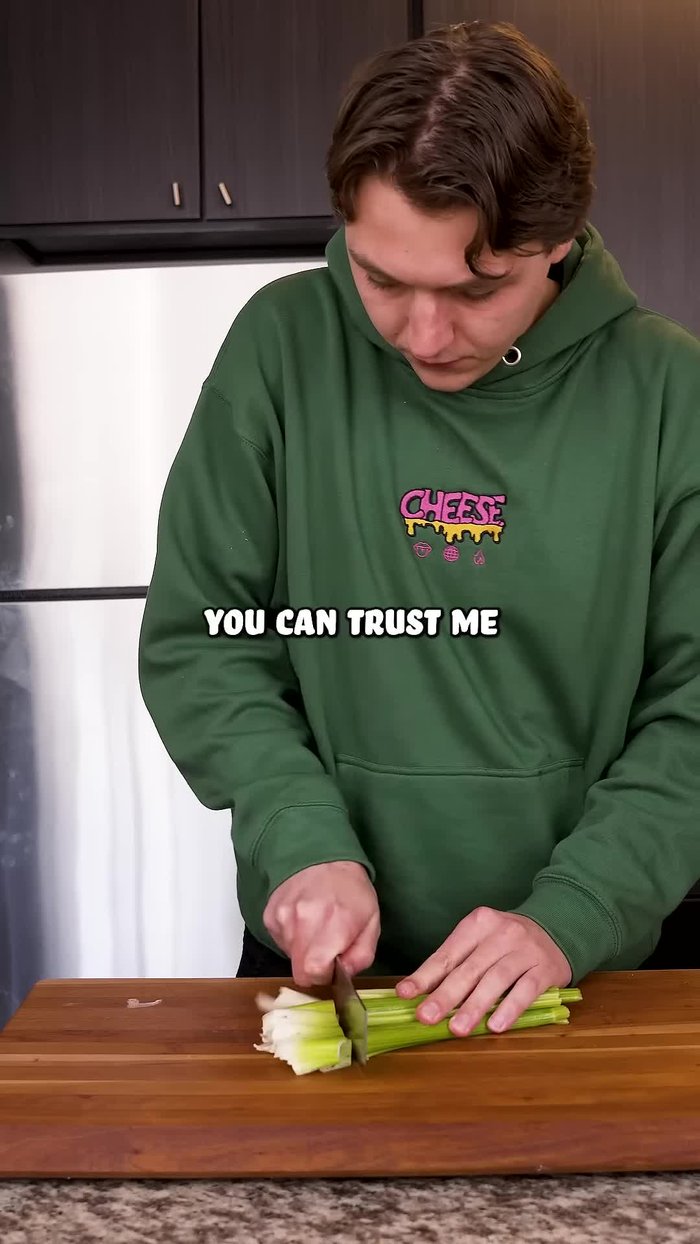Top with the other slice of bread, butter-side up.