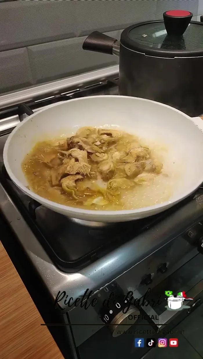 Cover and cook for 5-6 minutes until artichokes are softened.