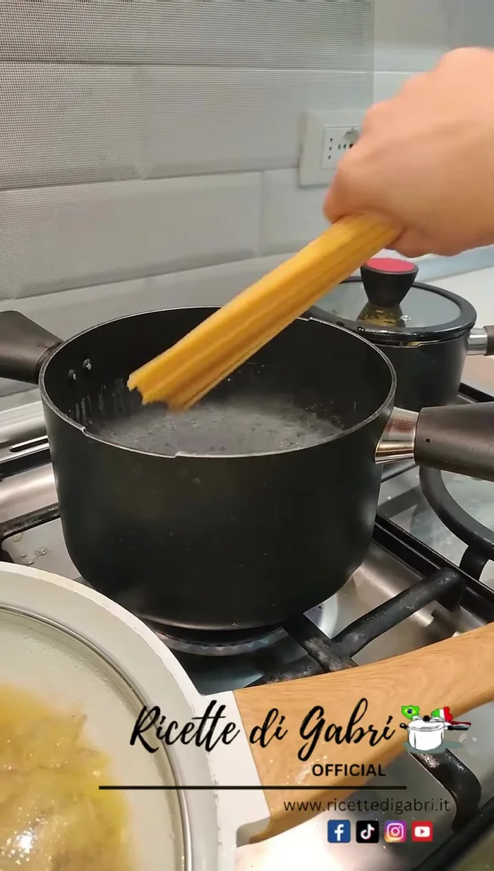 Add the pasta to the pan (cook pasta al dente, about 2 minutes before it's fully cooked).