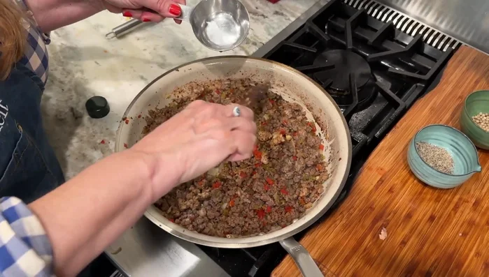 Cook everything down, adding a little water to create a nice sauce. This should take about 5 minutes.