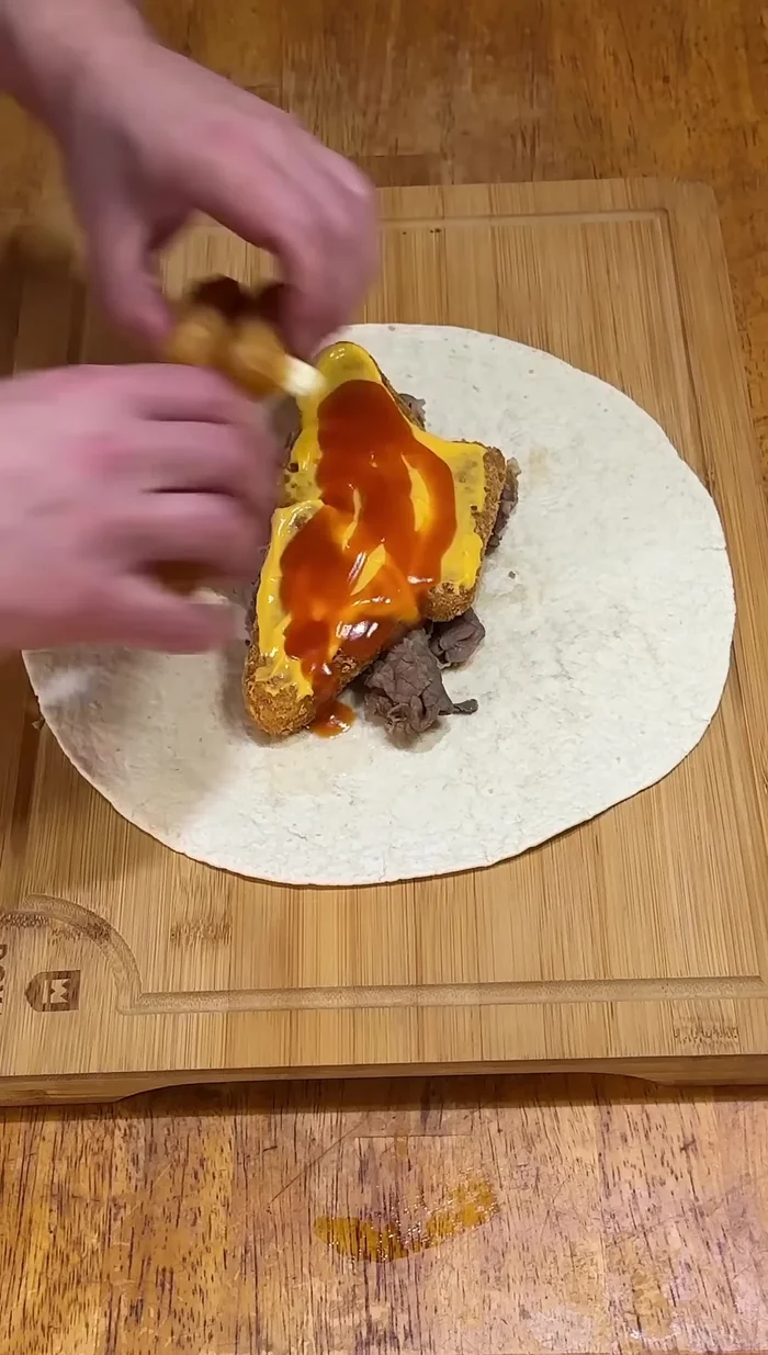 Add four cheese sticks on top.