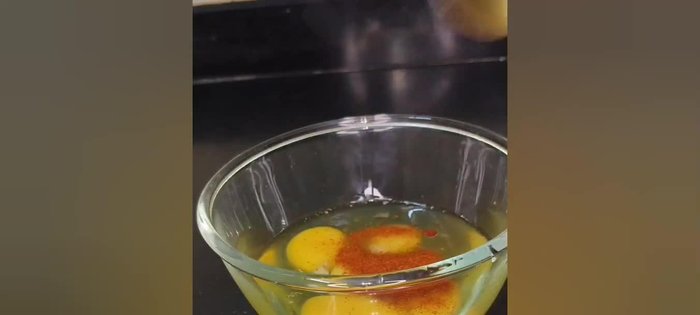 Break 4 eggs into a bowl.