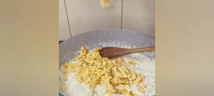 Add the whisked egg mixture and cook until thickened.