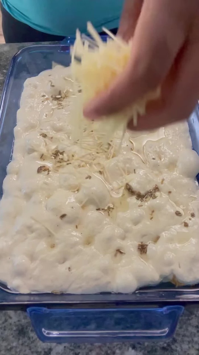 Finish preparing the ficaccia bread dough the next day.