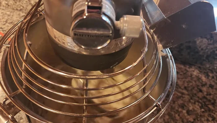 Knead the dough with the mixer for 5-7 minutes after it comes away from the sides.