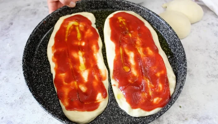 Bake: Bake the pizza tongues at 220°C until golden brown and crispy. This will take only a few minutes.